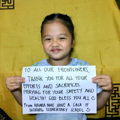 Elementary students in CdeO pen letters for front liners